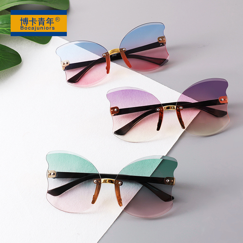 儿童新款太阳镜个性无框切边墨镜翅膀造型墨镜户外卡通眼镜DJ7717