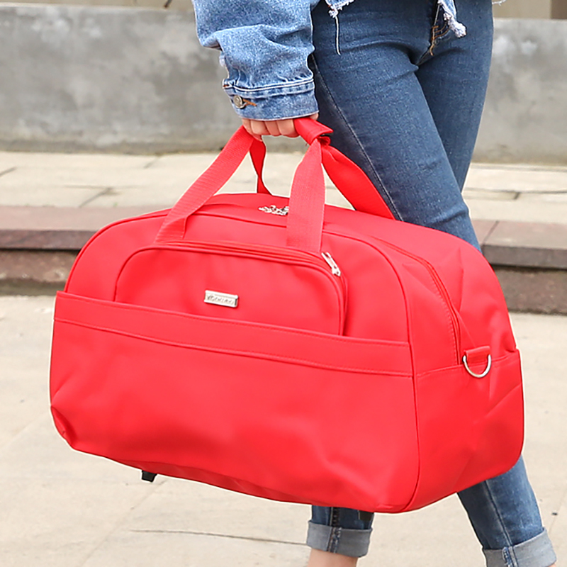 防水尼龙手提旅行包出差旅游大容量男女行李包结婚大红短途旅行袋