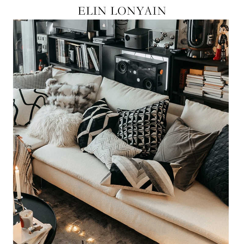 现代简约轻奢黑灰色系沙发搭配靠垫样板房客厅皮质拼接皮草抱枕