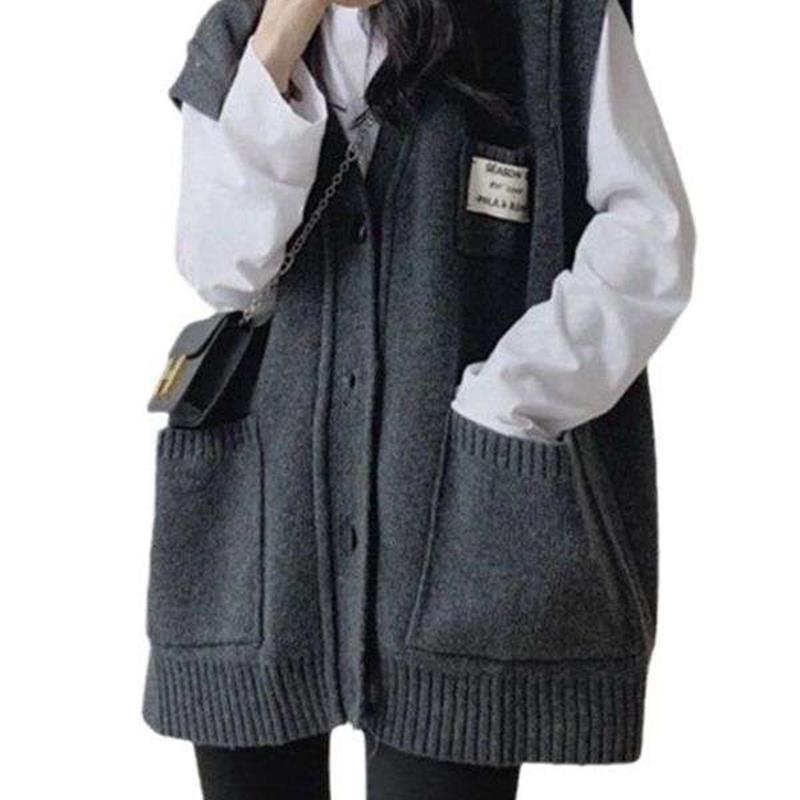 Large size fat knitted cardigan vest layered with sweater