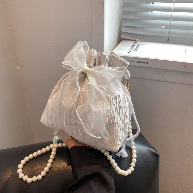 仙女珍珠包包女2022新款潮时尚甜美蝴蝶结水桶包小众百搭斜挎包