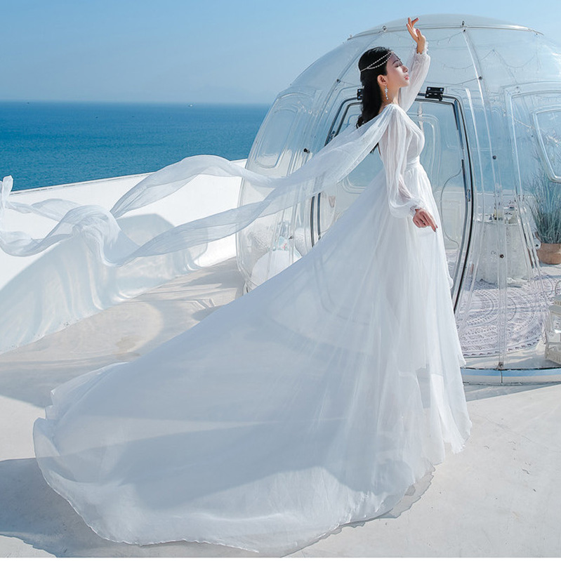 三亚海边沙滩裙女夏青海沙漠旅游拍照穿搭度假连衣裙白色长裙超仙