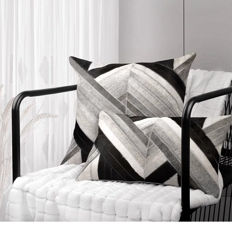现代简约轻奢黑灰色系沙发搭配靠垫样板房客厅真皮拼接皮草抱枕