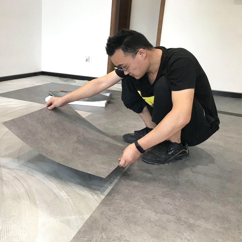 pvc石塑地板商用耐磨防水防滑办公室商铺电梯厅LVT片材石纹地板胶