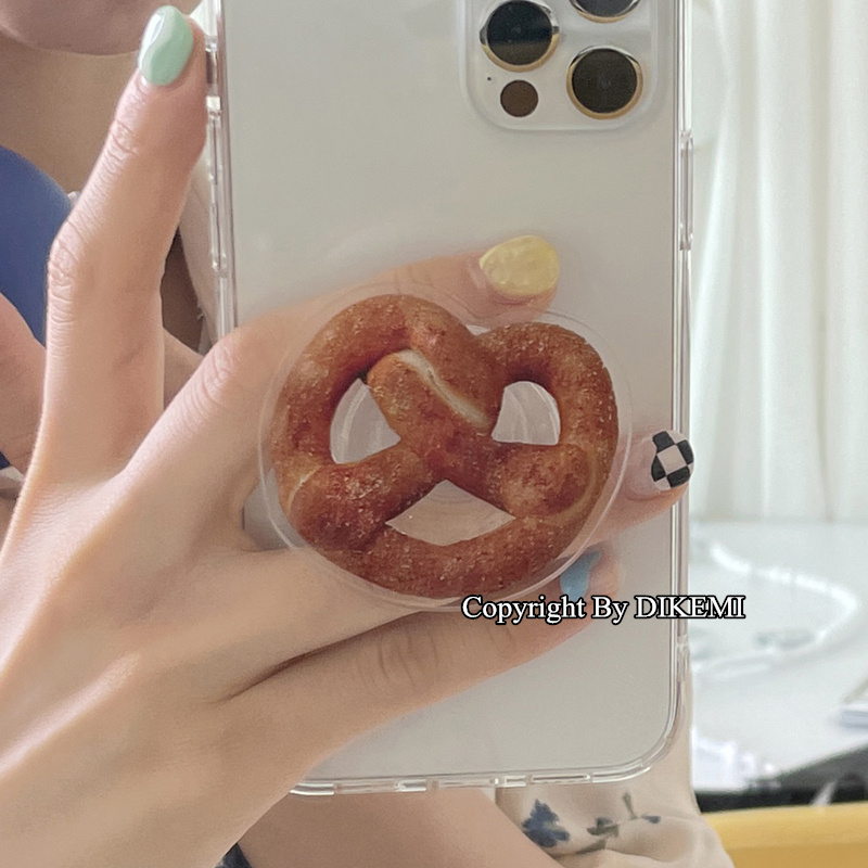 韩国ins椒盐卷饼气囊支架适用iphone15pro/14promax苹果13/11/12proXSmax手机壳