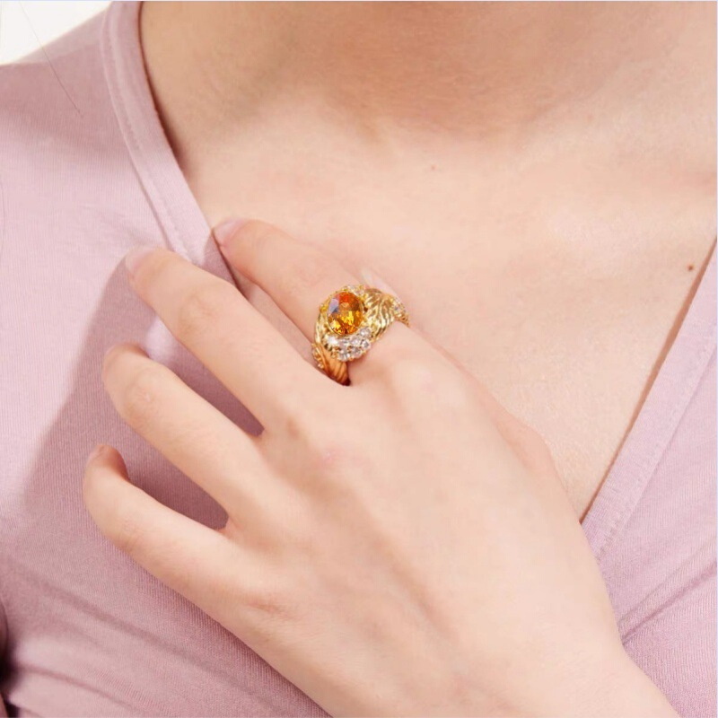 欧美布拉提织纹雕金羽毛拉丝金工艺戒指女心中的太阳橙色钻指环