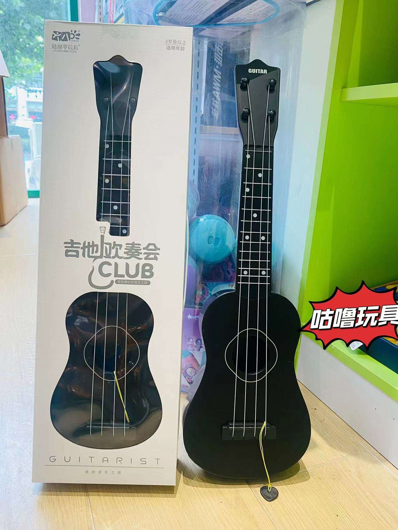 新款儿童玩具大号吉他尤克里里小黄鸭乐器涂鸦乐器可弹男孩女孩架